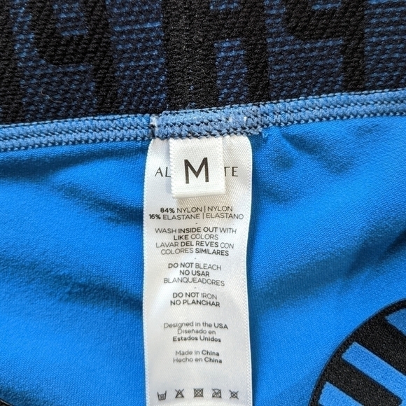 Alphalete Logo Waistband Criss Cross Ankle Leggings High Rise - Picture 6 of 6